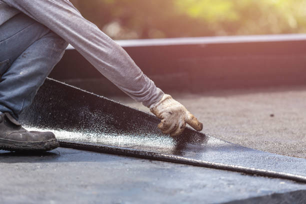Professional Waterproofing technician working in Pompton Lakes, NJ